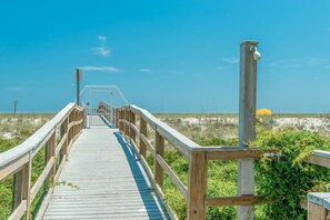 Outdoor shower by the beach walk