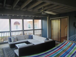 Lagoon view screened porch is perfect for relaxing!