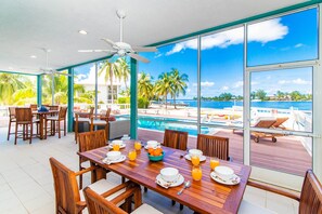 Large screened porch with ocean views.