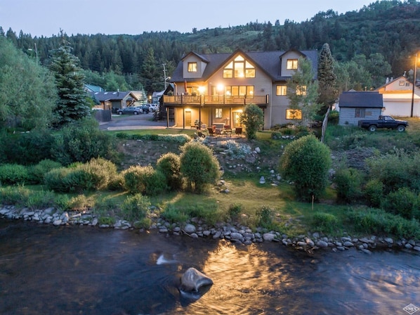 View of the house from across the river.