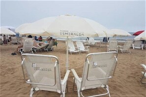 Beach chairs and umbrellas included in building services