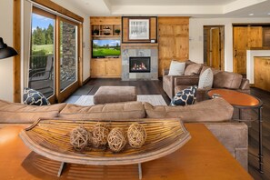 Trailhead Escape: - Comfortable couches in the great room with a gas fireplace.