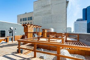 Rooftop Patio with plenty of seating and BBQ's.