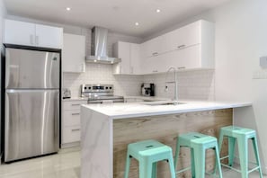 Fully-equipped kitchen with quality appliances to cook at home!