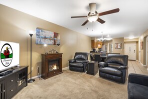 Living Room with Cable TV, Patio Access, Seasonal Fireplace