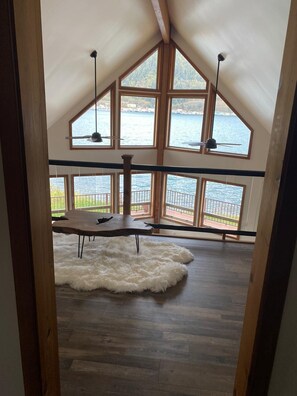 Enjoy a cup of coffee in the loft overlooking the waterfront views.