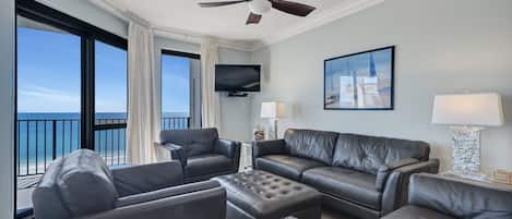 Spacious Open Plan Living Room with Plenty of Comfortable Seating, Sleeper Sofa, Flat Screen TV & DVD Player and Floor to Ceiling Views of the Gulf of Mexico 7