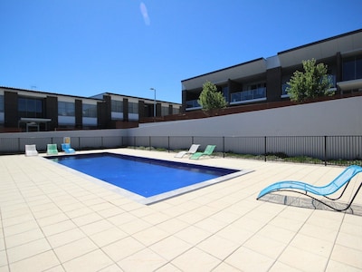 Generous backyard, 15mins to the CBD. Heated pool in complex. Brand new