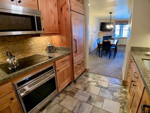 Modern kitchen with Sub-Zero and Wolf appliances.