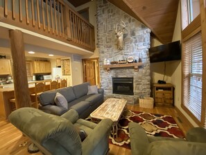 Spacious Living room with cathedral ceilings and brand new sleeper sofa