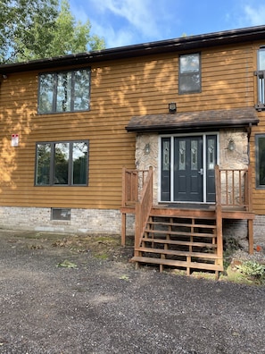 Main door. The condo is to the left of the stairs.