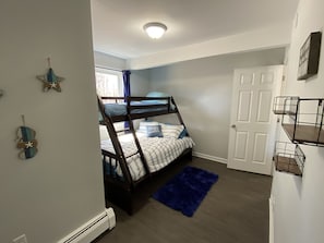 Second bedroom with twin over full bunk bed. 