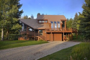 Oversized one-car Garage (easily fits mid-size SUV) & driveway parking.