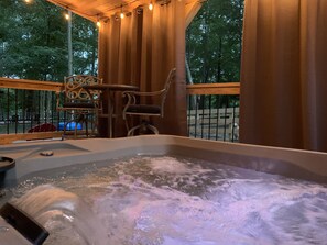 Enjoy adults only hot tub on your private covered porch year round