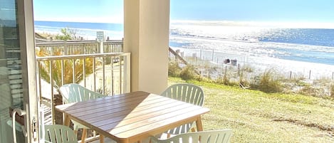 Covered patio steps to beach 