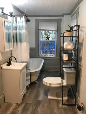 Updated bathroom with all the modern conveniences while maintaining it's charm. 