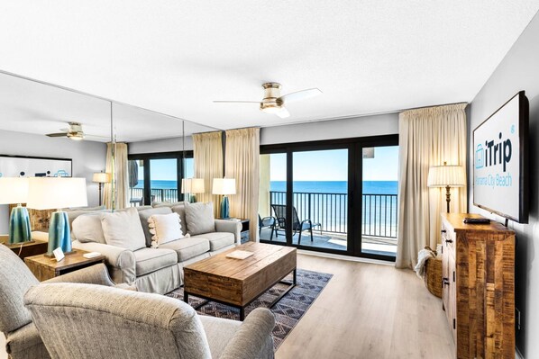 Cozy vibes in the living area with balcony access