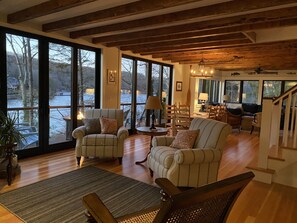 Great room with sweeping views of Lake Waramaug. 