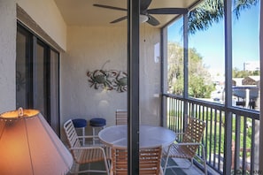 Your wonderfully private outdoor space - screened in lanai with dining spot will be your favorite.