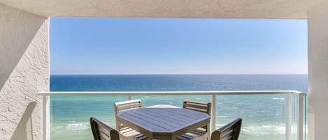 Shore Pleasure - Beachside 2- 4356 | Breathe Easy Rentals - Relax and enjoy the Gulf view from the patio - Shore Pleasure is professionally managed by Breathe Easy Rentals.