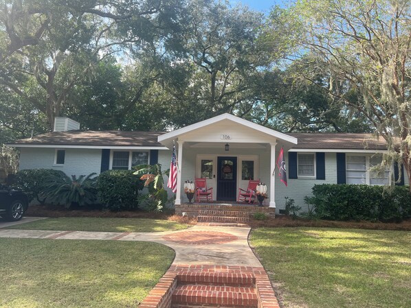 Freshly painted exterior, inviting front porch