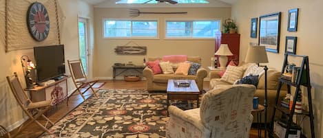 Bright and airy family room with plenty of seating 