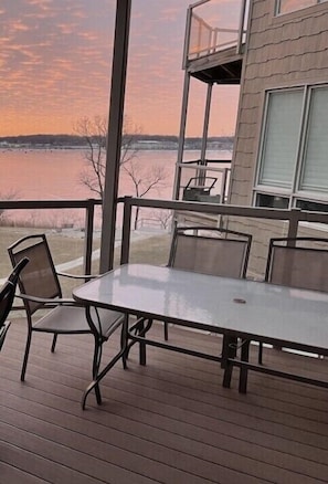 Breathtaking Sunset views from the deck with seating for six around the table.