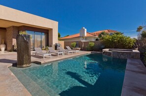 Complete privacy with saltwater pool and spa, outdoor dining, BBQ, and firepits.