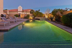 Complete privacy with saltwater pool and spa, outdoor dining, BBQ, and firepits.