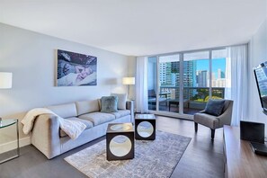 Living room, balcony access, Tv