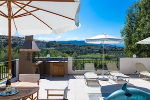 BBQ facilities by the pool.