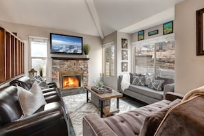 Natural lighting, wood burning fireplace, cable television, cozy seating