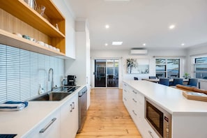 Gorgeous kitchen with all you might need for preparing family meals.