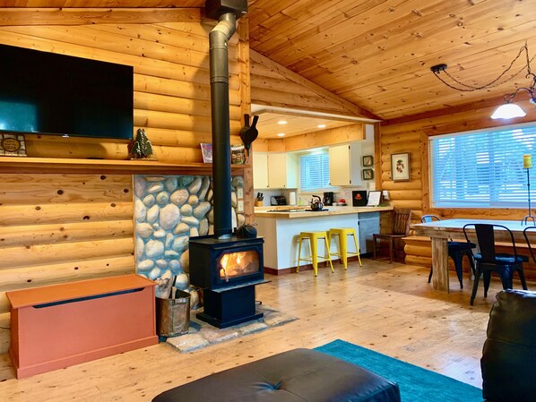 Open concept between dining, living, and kitchen