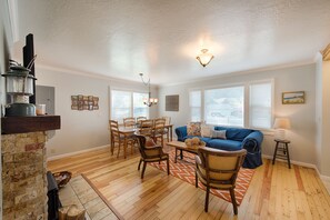 Rustic pine flooring throughout home.