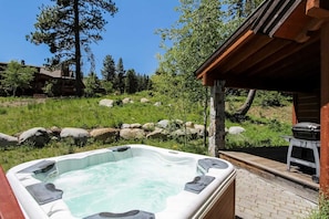 Clearwater Cottage 87 at Tamarack Resort - a covered patio and private hot tub. There is NO BBQ grill at this home,