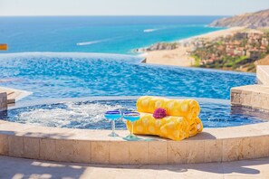 Jacuzzi and infinity pool with ocean views