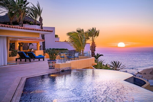 Gorgeous patio with infinity pool overlooking the ocean