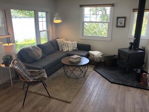 Comfy living room with wood fireplace. 