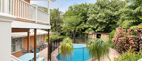 View of the pool from the walk down the stairs from the private master balcony 