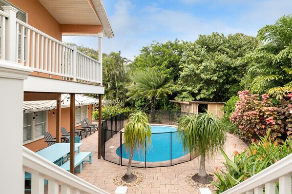 View of the pool from the walk down the stairs from the private master balcony 