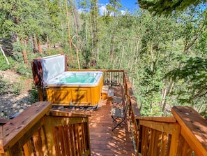 The private hot tub on the back has a nice walkway and fantastic setting