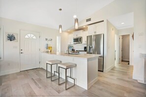 Bar top counter seating in the kitchen.