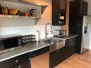 Kitchen with top-grade stainless appliances