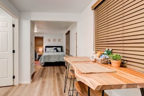 Acacia wood dining table with a view of the neighborhood