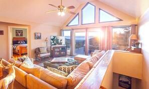 Spacious living room to gather with friends and family.