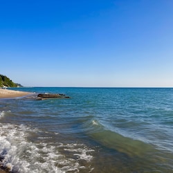 Miles of quiet Lk MI beaches with plenty of parking and privacy.