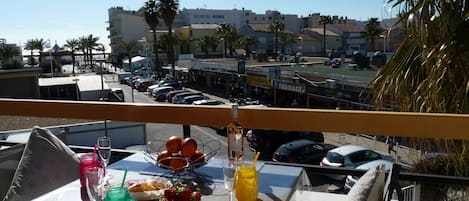 View of the city and the sea from the balcony