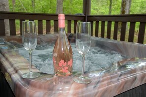 Rear deck outside hot tub to unwind and relaxation