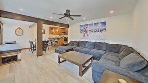 Full Living Room And Dining Room With Window Seat